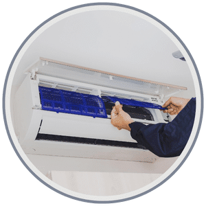 AC & Heating Tune-Up Special 2 HVAC technician performing a tune-up on an air conditioning and heating system