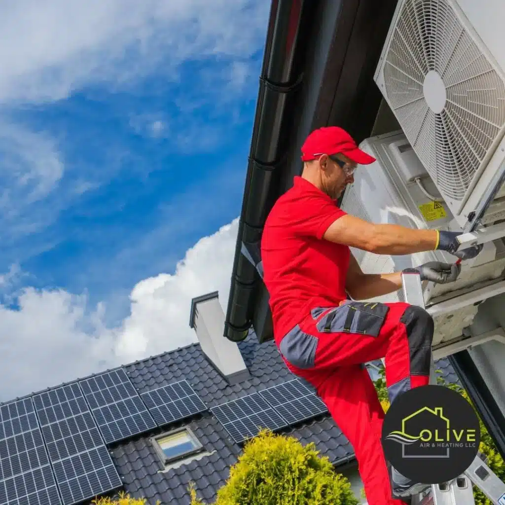 A team of HVAC professionals discussing installation options for a residential property in Tempe, AZ, showcasing top-rated HVAC installers near me.