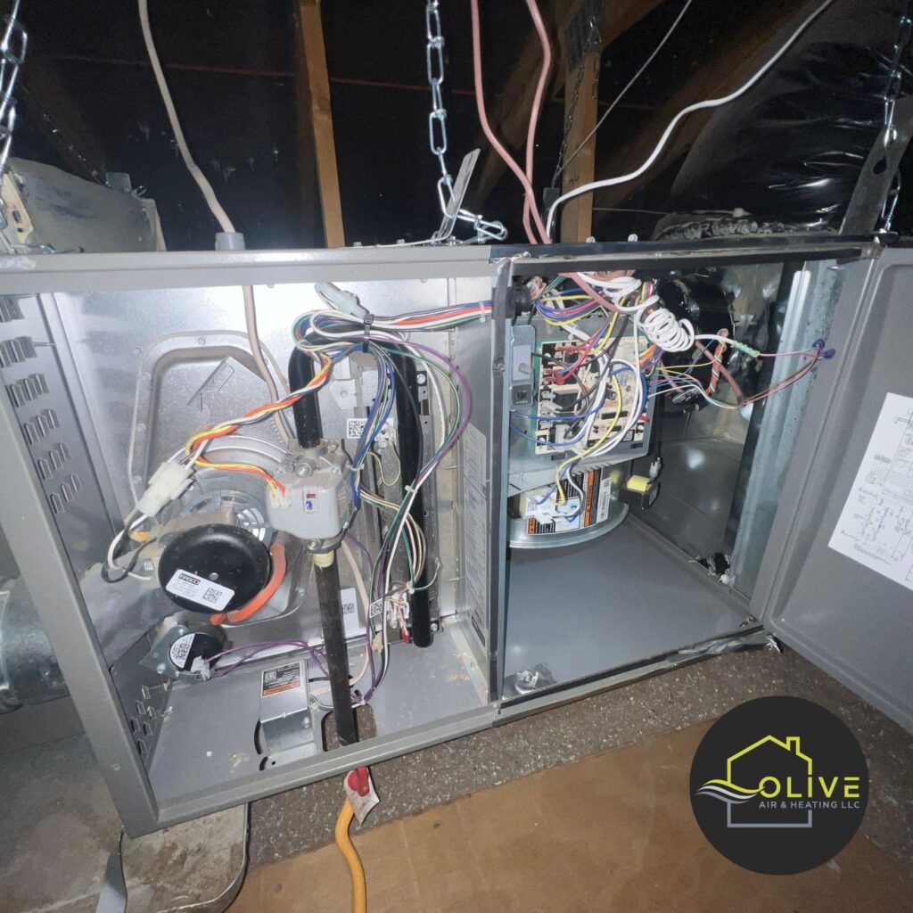 Homeowner checking the thermostat for signs of AC repair needs.