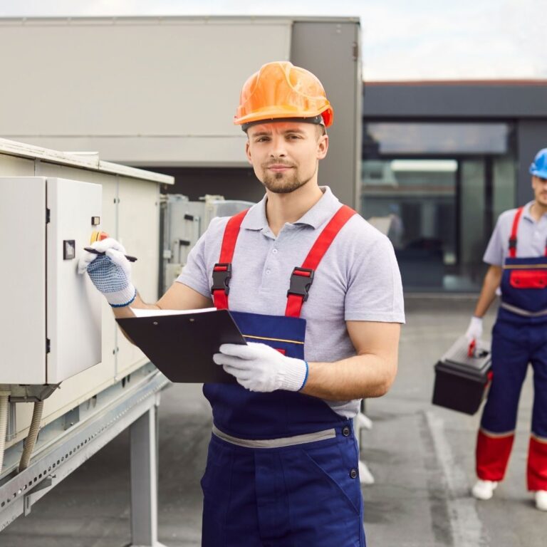 A technician working on the electrical components of an air conditioning unit, emphasizing the importance of professional Heating Repair Services in Glendale.