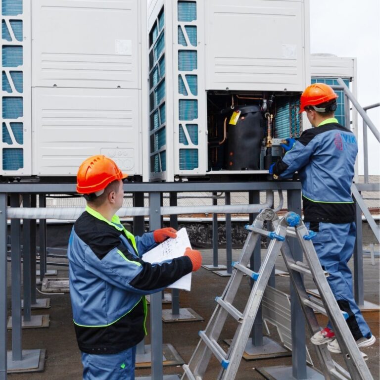 Professional HVAC technicians installing a new furnace as part of furnace services in Sun City West.
